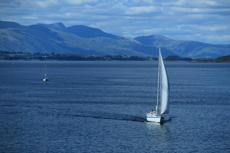 a sailboat in the middle of a large body of water